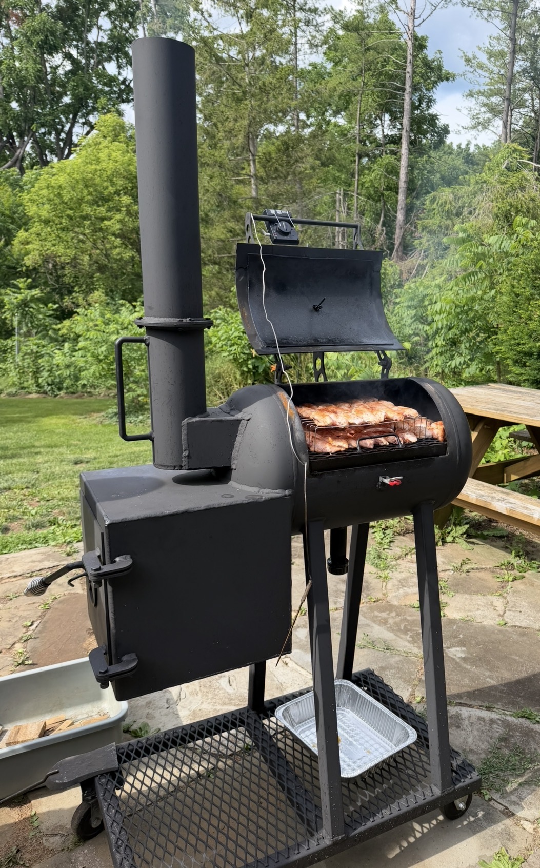 MMC Metalworks offset smoker cooking food